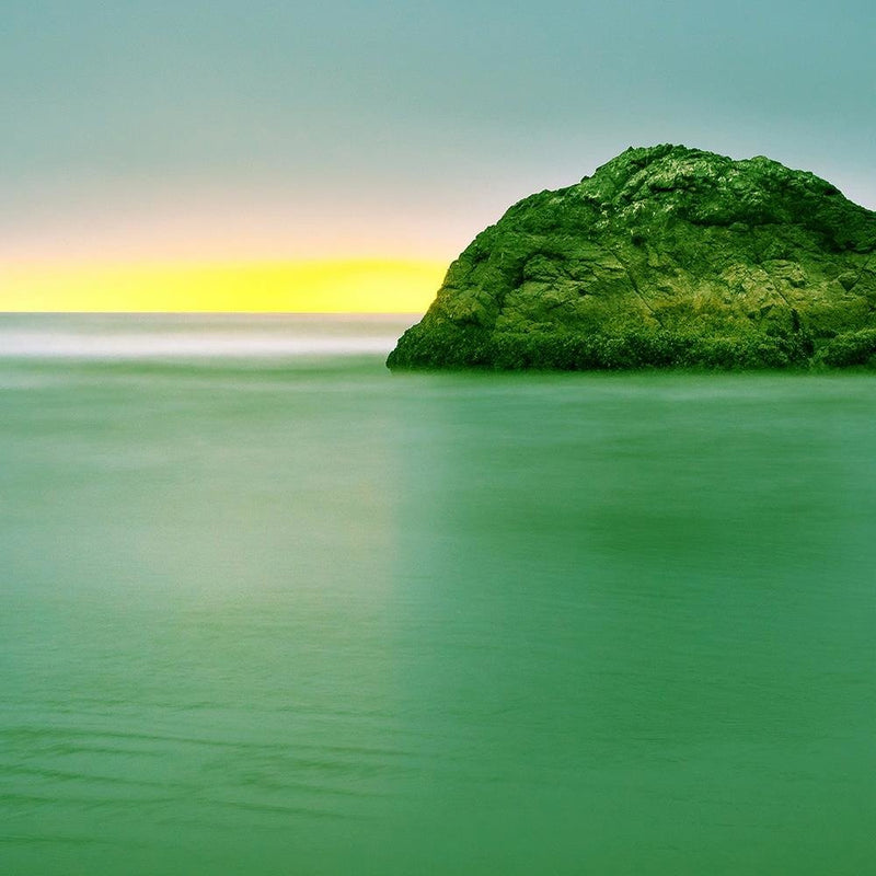 Glezna baltā rāmī - A Rock In The Sea At Dusk 3 